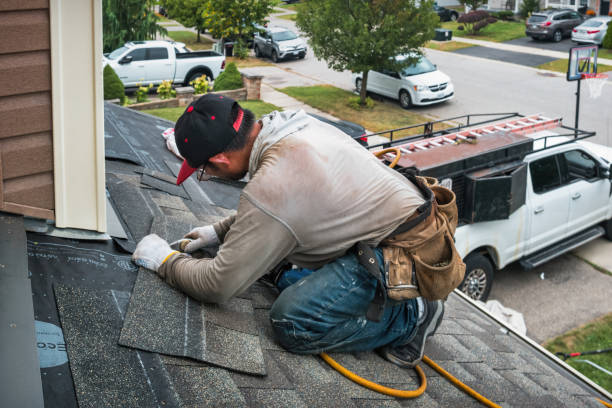 Professional Roofing technician working in Grantville, KS